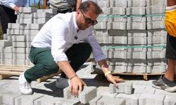 Tire'nin kırsal mahallelerine 20 bin metrekare kilit parke taşı desteği