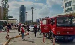İzmir Adliyesi yakındaki binanın 12.katındaki kadın için polis ve itfaiye ekipleri bölgede!
