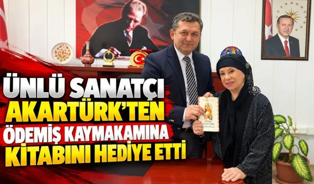 ÜNLÜ SANATÇI AKARTÜRK’TEN ÖDEMİŞ KAYMAKAMINA KİTABINI HEDİYE ETTİ